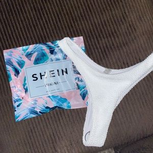 New with tags .Crisp white bikini bottom